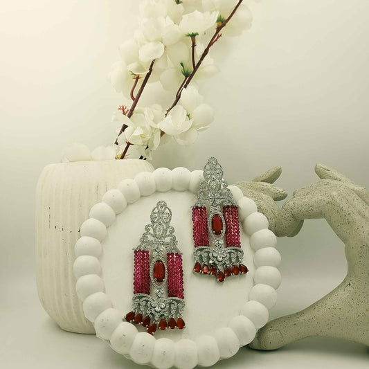 Silver-tone red beaded chandelier earrings with clear stones and teardrop drops