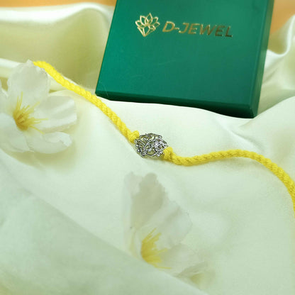 Filigree Leaf Handcrafted 92.5 Silver Rakhi with Yellow Thread