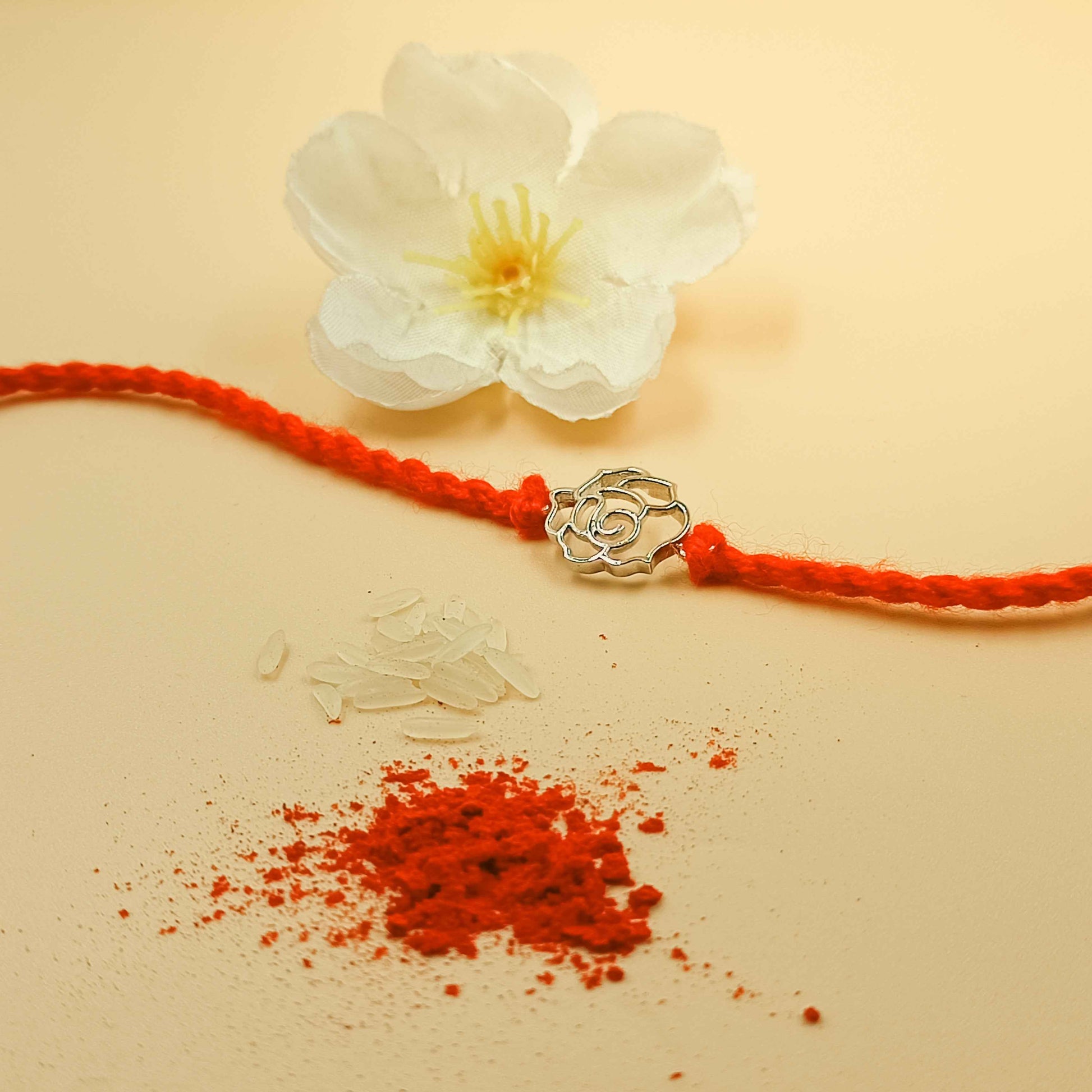 Rose Handcrafted 92.5 Silver Rakhi with Red Thread