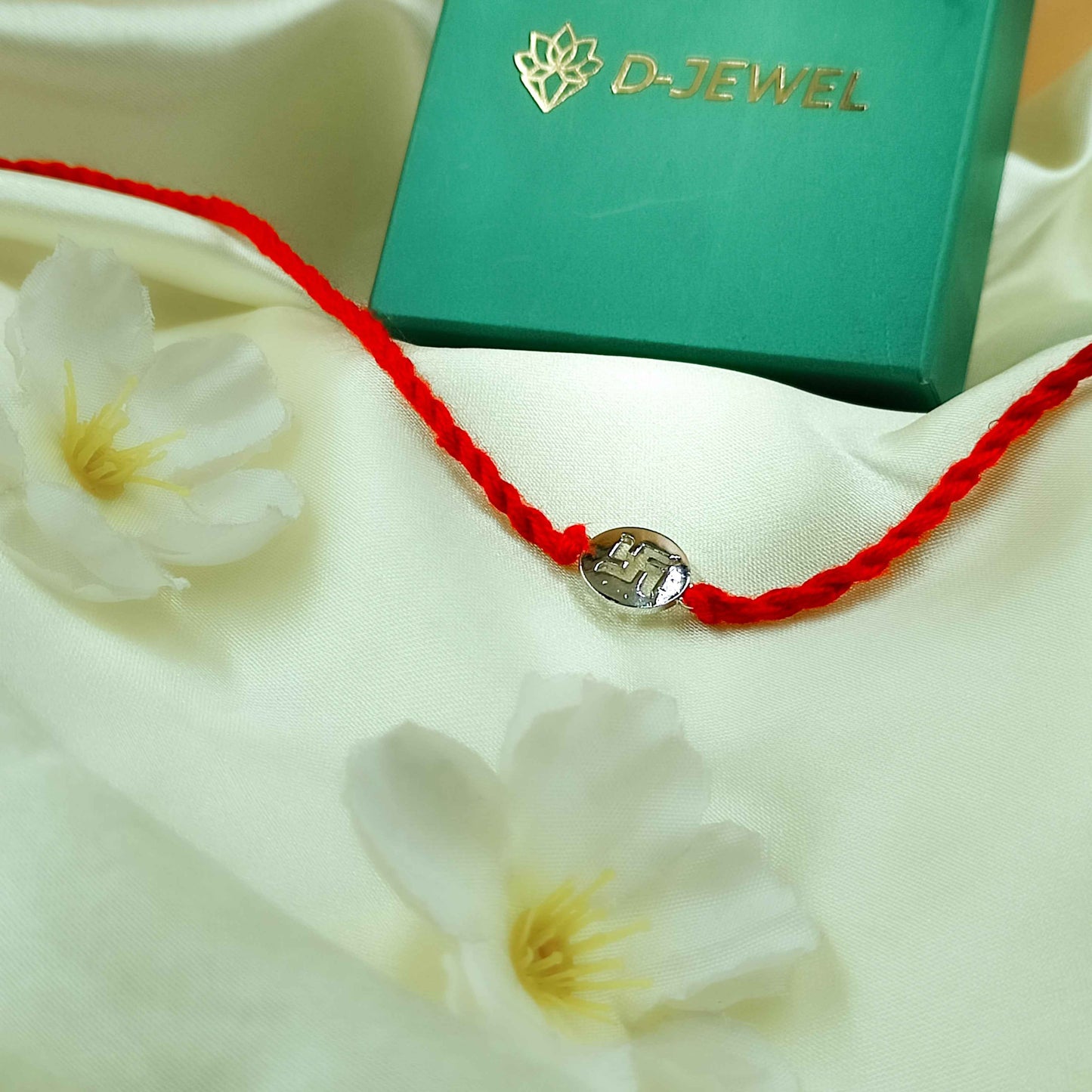 Swastik Handcrafted 92.5 Silver Rakhi with Red Thread