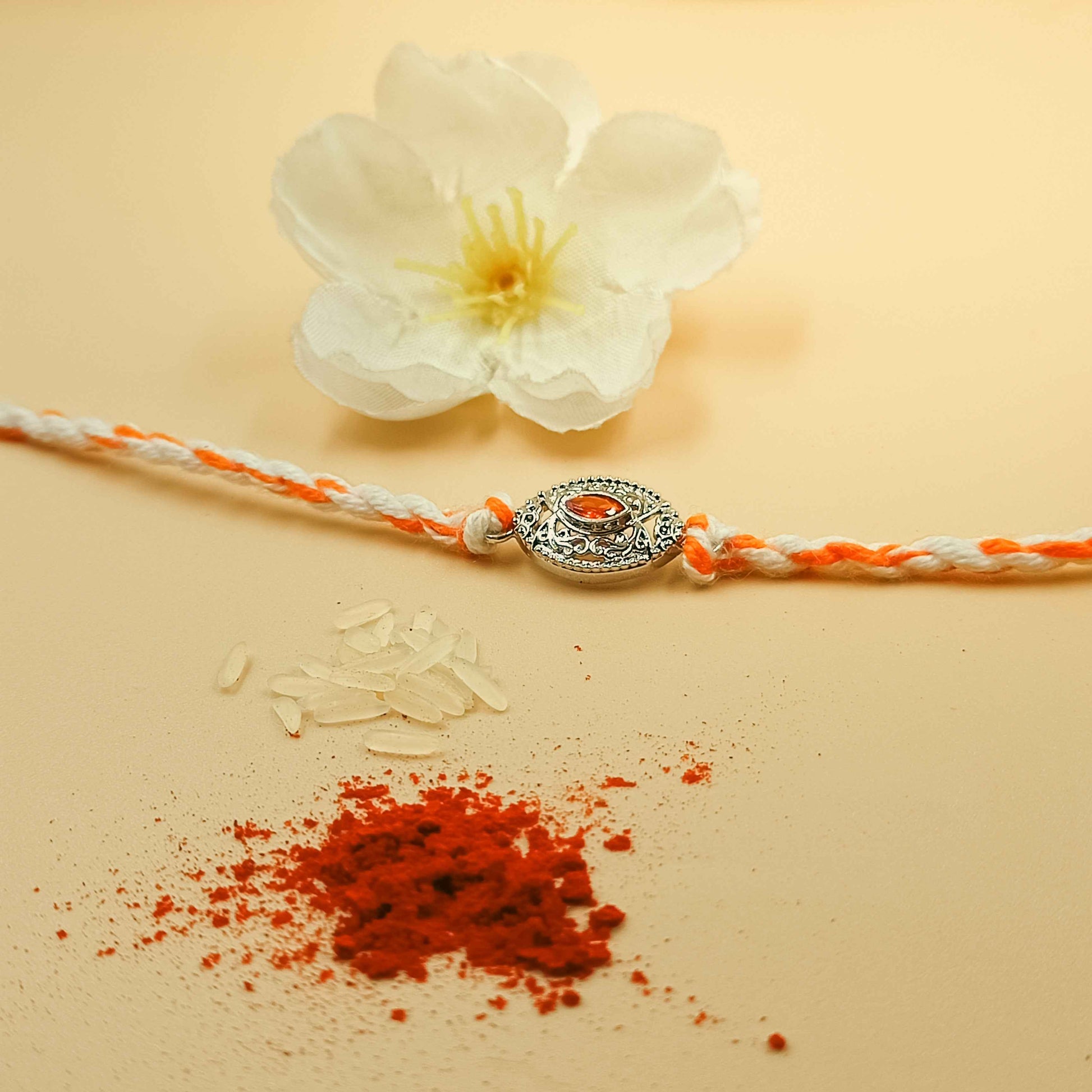 Antique Handcrafted 92.5 Silver Rakhi with Orange Stone