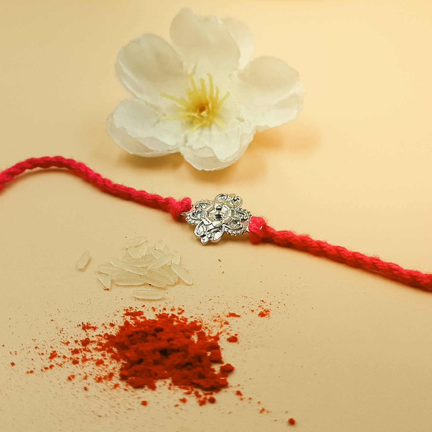 Floral Handcrafted 92.5 Silver Rakhi with Red Thread