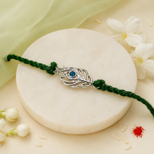 Peacock Feather Handcrafted 92.5 Silver Rakhi with Blue Stone and Green Thread