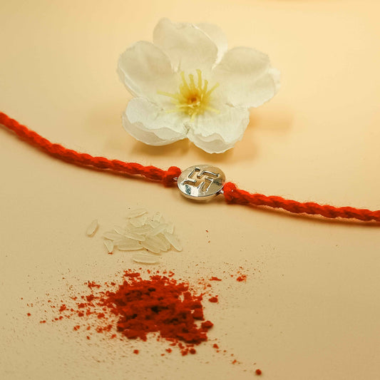 Swastik Handcrafted 92.5 Silver Rakhi with Red Thread